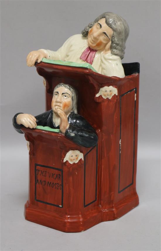 A Staffordshire figure group, The Preacher and Moses height 24cm